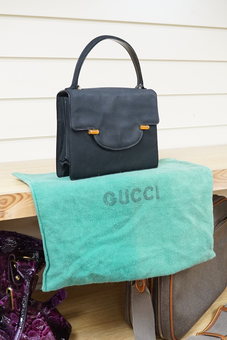 Two 1950's-60's Gucci handbags with one dust bag, largest 26cm wide